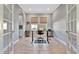 Bright home office with hardwood floors and stylish built-ins at 5403 Tidewater Preserve Blvd, Bradenton, FL 34208