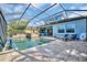 Large pool and spa with covered lanai and water view at 5403 Tidewater Preserve Blvd, Bradenton, FL 34208