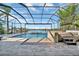 Enjoy the view from this screened-in pool and spa at 5403 Tidewater Preserve Blvd, Bradenton, FL 34208
