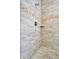 Walk-in shower with tile surround and built-in seat at 5403 Tidewater Preserve Blvd, Bradenton, FL 34208