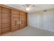 Bright bedroom with double door closet and built-in shelves at 5911 Midnight Pass Rd # 504, Sarasota, FL 34242