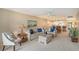 Living room, open concept with kitchen and dining area at 5911 Midnight Pass Rd # 504, Sarasota, FL 34242