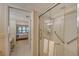 Walk-in shower with grab bars and tiled walls at 5911 Midnight Pass Rd # 504, Sarasota, FL 34242