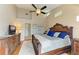 King-size bed in this spacious main bedroom with golf course views at 6620 Pineview Ter, Bradenton, FL 34203