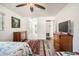 Spacious bedroom with ceiling fan, hardwood floors and ample closet space at 665 Park Cir # 58, Bradenton, FL 34207
