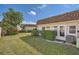 Exterior of building with well-maintained lawn at 665 Park Cir # 58, Bradenton, FL 34207