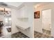 White kitchen with built in counter and access to bathroom at 665 Park Cir # 58, Bradenton, FL 34207
