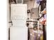 Stackable washer and dryer, water heater, and electrical panel at 665 Park Cir # 58, Bradenton, FL 34207