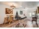 Spacious living room with hardwood floors, a Christmas tree, and comfy seating at 665 Park Cir # 58, Bradenton, FL 34207