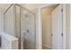 Clean shower with glass enclosure and tiled walls at 6870 Willowshire Way, Bradenton, FL 34212