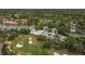 Aerial view of community near golf course at 7732 Palm Aire Ln, Sarasota, FL 34243