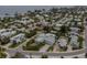 Coastal neighborhood with teal house highlighted at 796 Jacaranda Rd, Anna Maria, FL 34216