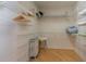 Large walk-in closet with wire shelving and plenty of storage space at 796 Jacaranda Rd, Anna Maria, FL 34216