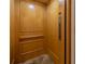 Residential elevator with wood paneling at 796 Jacaranda Rd, Anna Maria, FL 34216