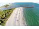 Aerial view of a beach with clear water at 801 Church St, Nokomis, FL 34275