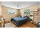 Spacious bedroom with wood floors and ample closet space at 801 Church St, Nokomis, FL 34275