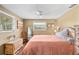 Spacious bedroom with king bed, dresser, and wood floors at 801 Church St, Nokomis, FL 34275