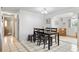Charming dining area with a table and chairs, near kitchen at 801 Church St, Nokomis, FL 34275