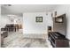 Open living space with comfortable seating and large TV at 801 Church St, Nokomis, FL 34275
