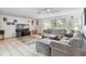 Spacious living area with comfortable seating and a view of the street at 801 Church St, Nokomis, FL 34275