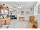 Cozy living room with built-in shelving and a view into dining area at 801 Church St, Nokomis, FL 34275
