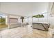 Relaxing screened patio with hot tub and seating area at 801 Church St, Nokomis, FL 34275