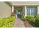 Inviting entryway with columns and landscaping at 8313 Barton Farms Blvd, Sarasota, FL 34240