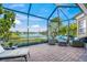 Comfortable patio furniture with lake view at 8313 Barton Farms Blvd, Sarasota, FL 34240