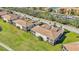 Aerial view of condo building, showcasing its location and features at 8402 Grand Estuary Trl # 104, Bradenton, FL 34212