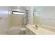 Clean bathroom with shower/tub combo and vanity at 103 Raphael Pl, Nokomis, FL 34275