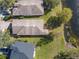 House and backyard view from above, near a lake at 15230 Searobbin Dr, Lakewood Ranch, FL 34202