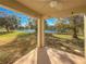 Covered back patio overlooking a pond at 15230 Searobbin Dr, Lakewood Ranch, FL 34202