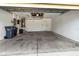Spacious garage with open door and storage at 15230 Searobbin Dr, Lakewood Ranch, FL 34202