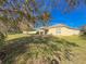 View of the back of the house and yard at 15230 Searobbin Dr, Lakewood Ranch, FL 34202