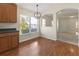 Kitchen features a breakfast nook and wood cabinets at 15230 Searobbin Dr, Lakewood Ranch, FL 34202