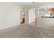Spacious living room leading to kitchen and bathroom at 15230 Searobbin Dr, Lakewood Ranch, FL 34202