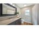 Clean bathroom with updated vanity and fixtures at 1598 Oak N Cir, Sarasota, FL 34232