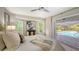 Main bedroom with pool view and sliding glass doors at 1598 Oak N Cir, Sarasota, FL 34232
