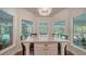Bright breakfast nook with pool views at 1598 Oak N Cir, Sarasota, FL 34232
