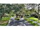 The Lakes Estates entrance, with lush landscaping and a welcoming atmosphere at 1598 Oak N Cir, Sarasota, FL 34232