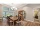 Formal dining room with built-in hutch and wood table at 1598 Oak N Cir, Sarasota, FL 34232