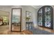Elegant entryway with mirror reflecting dining area at 1598 Oak N Cir, Sarasota, FL 34232