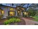 Attractive curb appeal with a well-maintained walkway and landscaping at 1598 Oak N Cir, Sarasota, FL 34232