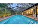 Inviting, screened-in pool area, perfect for relaxation at 1598 Oak N Cir, Sarasota, FL 34232