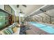 Spacious pool area with screened enclosure and comfortable seating at 1598 Oak N Cir, Sarasota, FL 34232