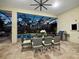 Covered patio with dining area, pool view, and built-in grill at 16528 Berwick Ter, Bradenton, FL 34202