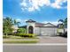 Beautiful single-story home with tile roof and two-car garage, landscaped front yard at 16528 Berwick Ter, Bradenton, FL 34202