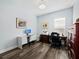 Home office with wood desk and window, hardwood floors at 16528 Berwick Ter, Bradenton, FL 34202