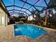 Relaxing screened pool and spa with surrounding patio at 16528 Berwick Ter, Bradenton, FL 34202