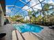 Screened pool and patio with plenty of space for lounging at 16528 Berwick Ter, Bradenton, FL 34202